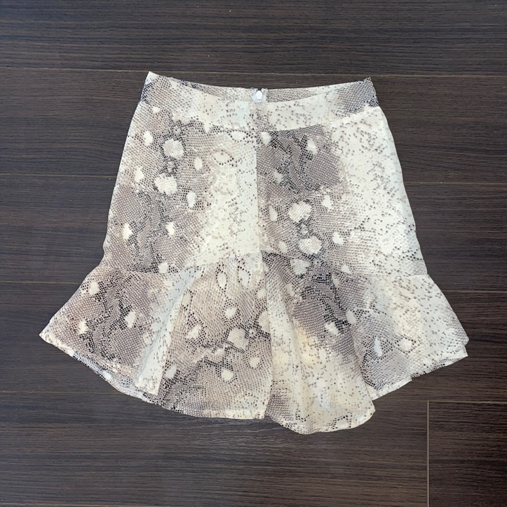 Fit and (slight) flare snake print skirt